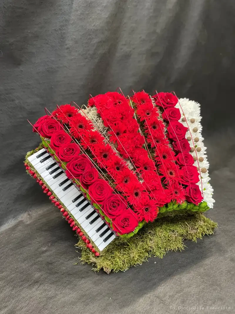 Accordéon — composition florale Coccinelle